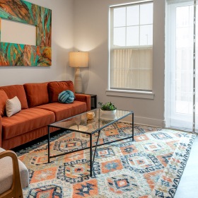 room with couch and glass patio doors Gorgeous natural light in your living space