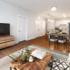 spacious living area on wood-style flooring