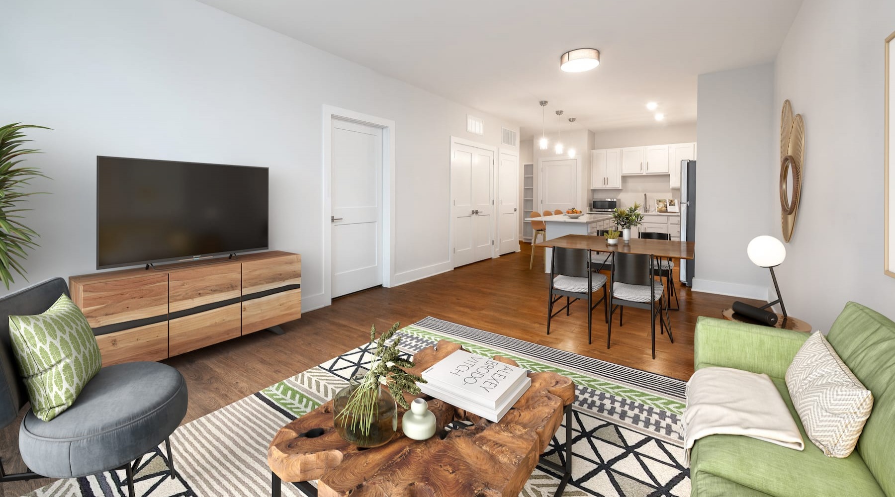 spacious living area on wood-style flooring
