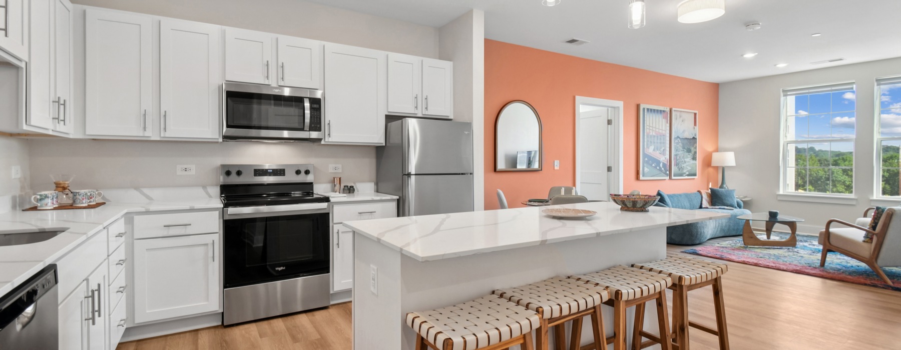 Amenities Page kitchen with island and dining area